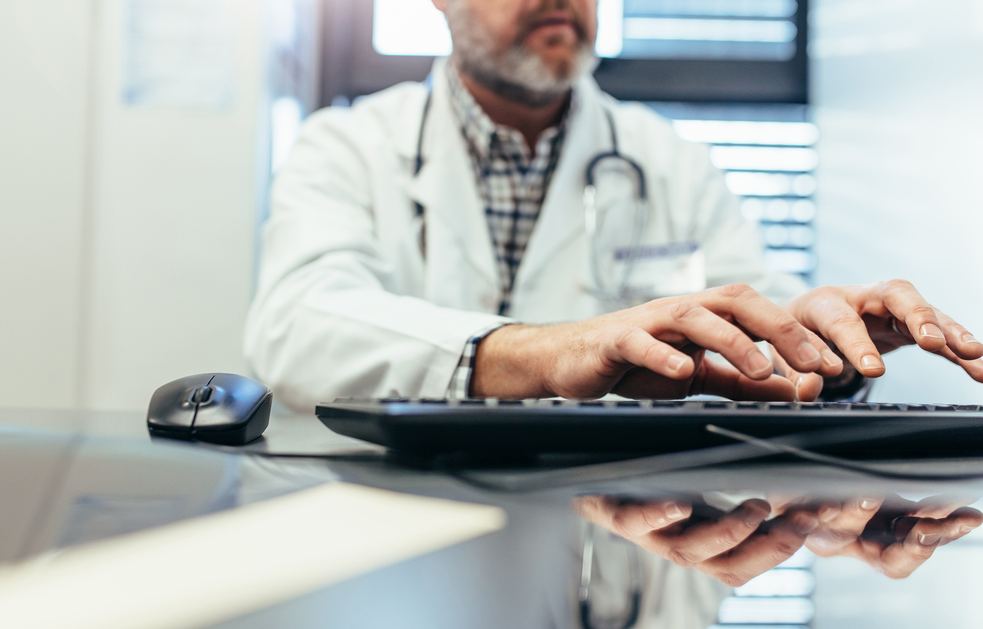 Doctor working on computer