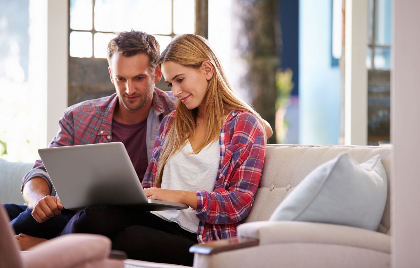 Couple sitting on couch