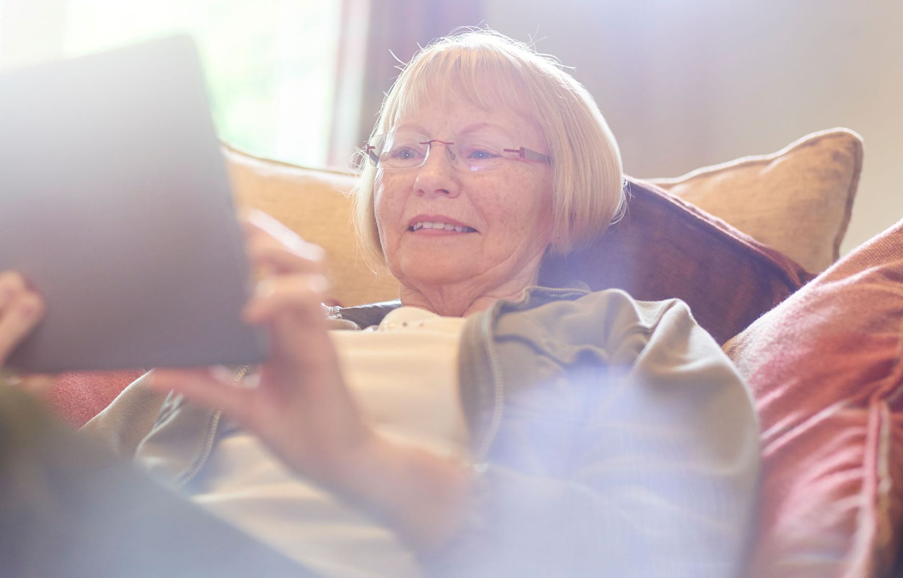 Woman looking at tablet