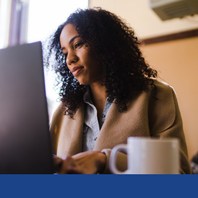 Woman looking on her laptop